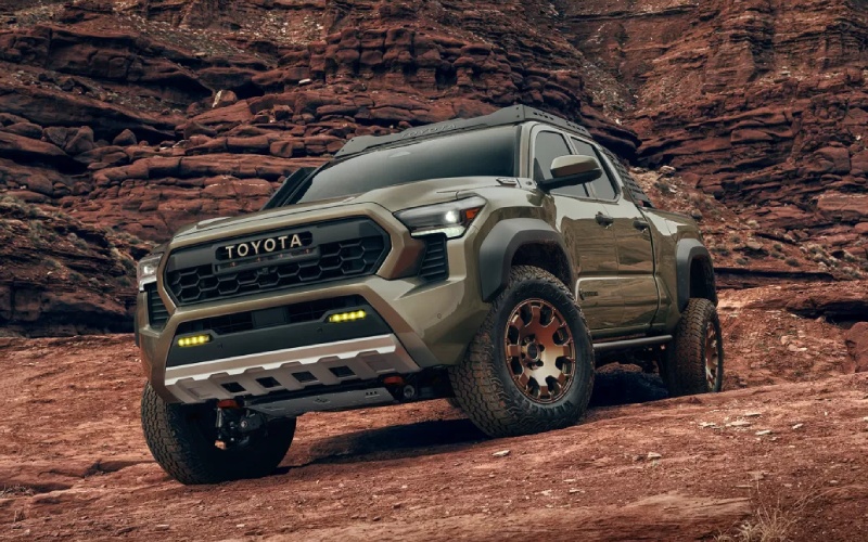 Which truck is better for mountain roads near Kalispell, MT — the 2026 Toyota Tacoma or 2026 Honda Ridgeline?